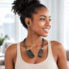 Wireless Neckband Bluetooth Headset worn by woman Wireless Neckband Bluetooth Headset worn by woman