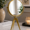 Gold double-face table clock with tripod stand Gold double-face table clock with tripod stand