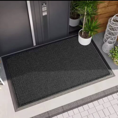 Heavy-Duty Honeycomb Dirt Trapper Doormat.2 Heavy-Duty Honeycomb Dirt Trapper Doormat at home entrance