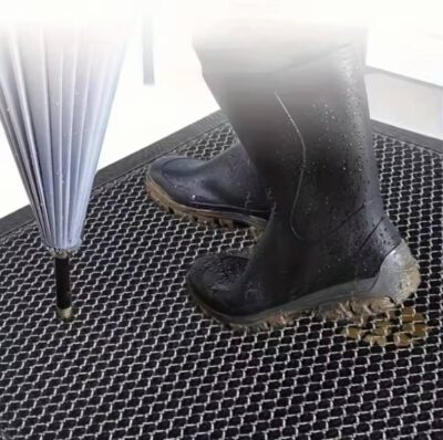 Heavy-Duty Honeycomb Dirt Trapper Doormat.3 Honeycomb dirt trapper doormat with muddy boots
