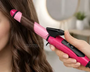 NOVA 2-in-1 Curler-Straightener 1 NOVA 2-in-1 Hair Curler creating curls