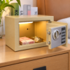 Open digital steel safe box storing cash and jewellery
