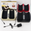 Electric foot massager in black burgundy and cream colours with power adapter